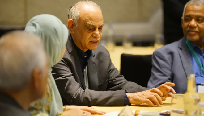 Ziauddin Sardar engages in a dinner conversation